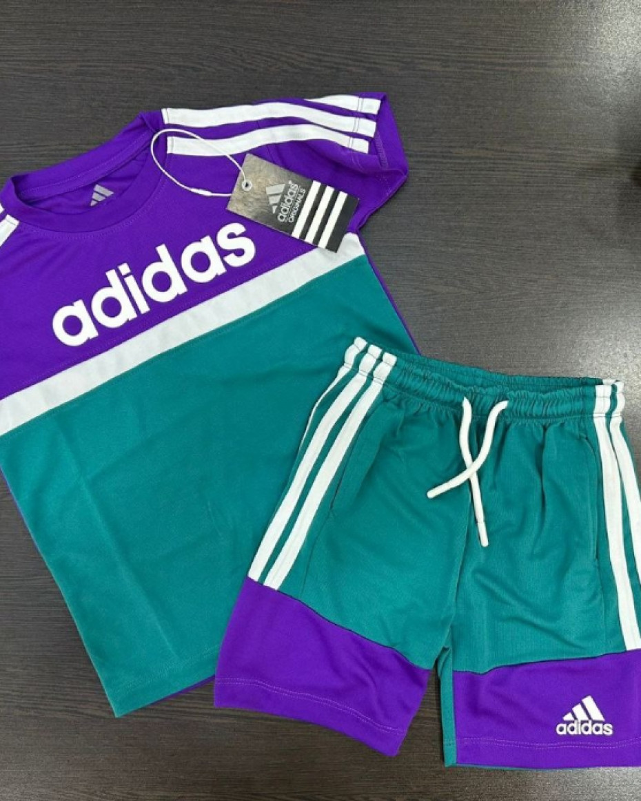 QUALITY ADIDAS BRAND JERSEY FABRIC POLO SHORT.... PURPLE
