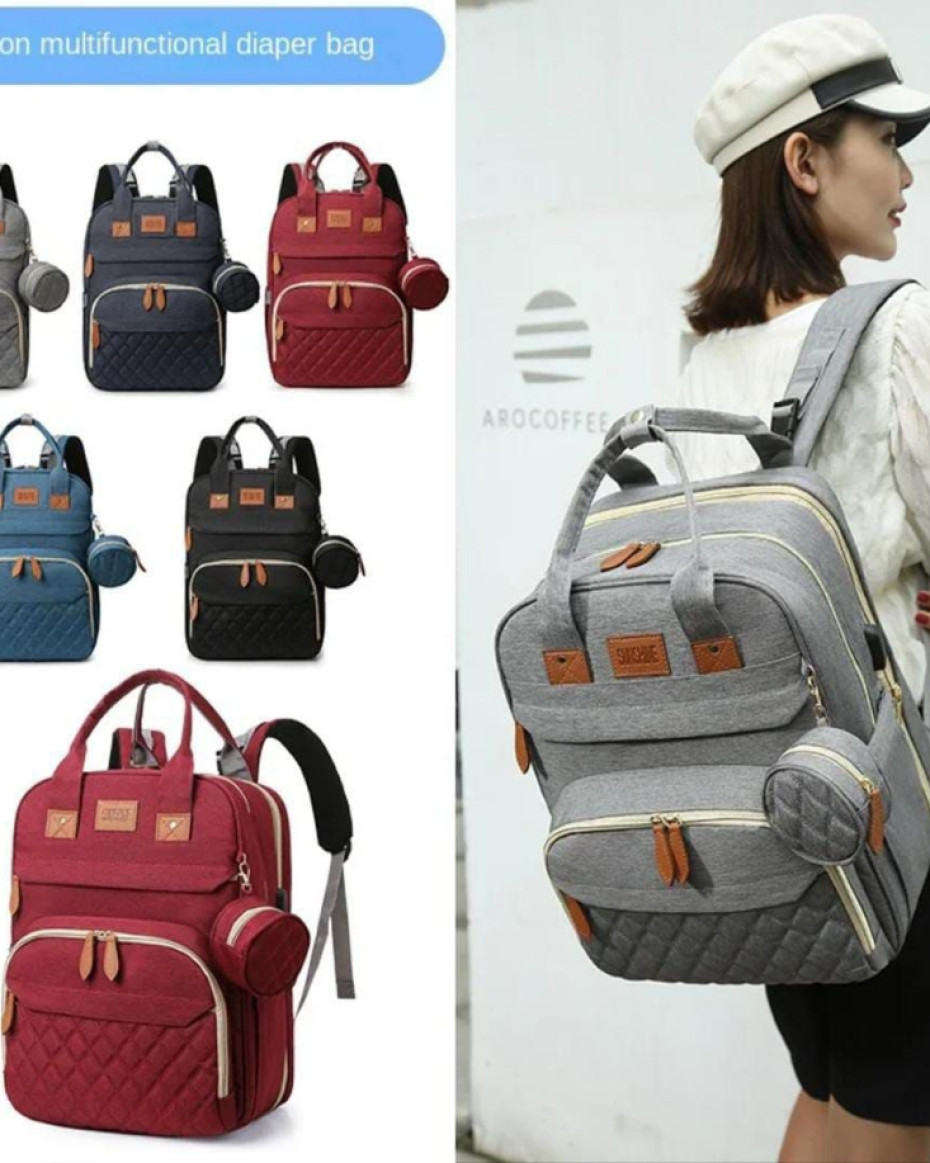 *QUALITY BABY BED AND BAG WITH DETACHABLE PURSE,NET AND CABLE CHARGER CONNECTOR