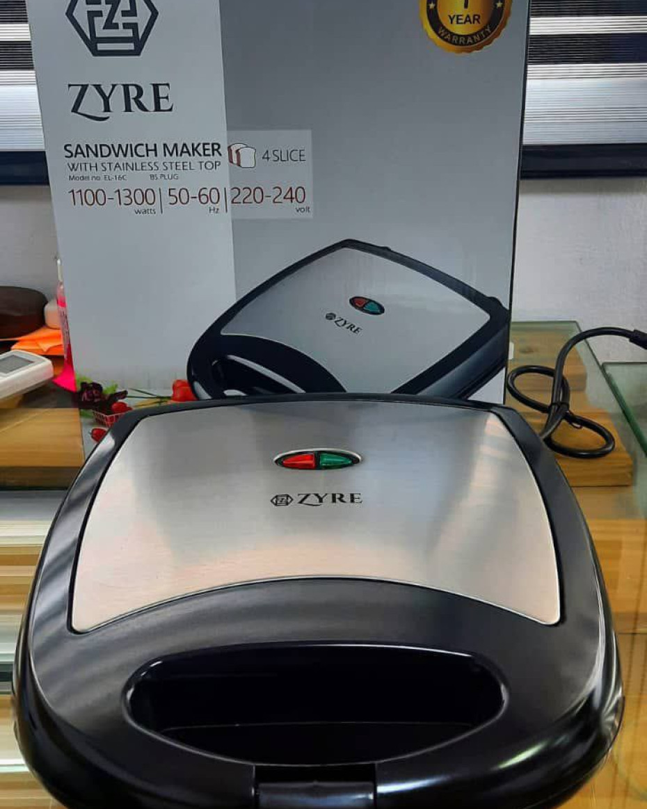 *NON STICK HIGH QUALITY COATING 4 FACE/SLICE SANDWICH MAKER/TOASTER...